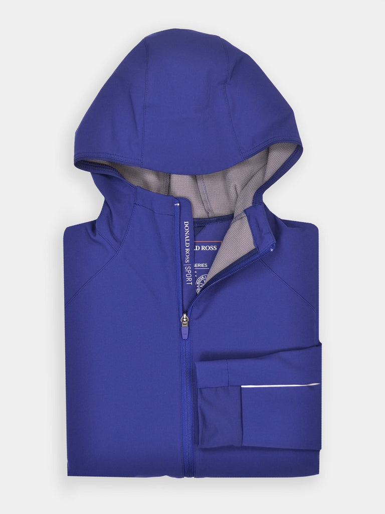 Folded blue hooded jacket with a partial zip, displayed against a white background