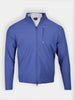 Blue zip-up golf jacket with a high collar and subtle stitching details. The sleek design features a zipped chest pocket and appears lightweight and modern