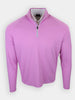 Long-sleeved, light pink zip-up shirt displayed against a white background.