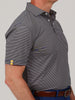 A man in a blue and yellow striped polo shirt is shown from the side against a plain background. The shirt has a small yellow patch on the sleeve.