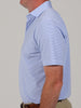 A person in a blue and white striped polo shirt and khaki pants, viewed from the side against a neutral background. The tone is casual and neat.