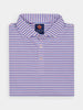 A neatly folded golf polo shirt with horizontal red, blue, and white stripes