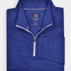 Folded blue pullover with a half-zip design and a structured collar