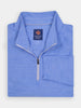 Folded light blue quarter-zip pullover with a high collar and visible black zipper