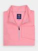 Folded, light pink quarter-zip pullover with collar, displaying a navy label