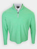 A green long-sleeve pullover with a half-zip collar is displayed against a white background.
