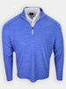 Long-sleeve, blue athletic pullover with a zippered collar displayed on a neutral background.