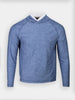 Blue heathered long-sleeve pullover with a white collared shirt underneath, isolated on a white background