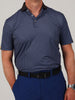 Curtis argyle print with solid knit collar, a garment featuring a black belt and blue pants