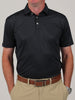 Mitchel club and ball print, a garment featuring a black short-sleeve golf polo with a golf club and ball micro-print and a classic three-button placket.