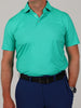 Mitchel club and ball print, a garment featuring a light jade performance polo shirt with a repeating golf club and ball print and a solid knit collar.