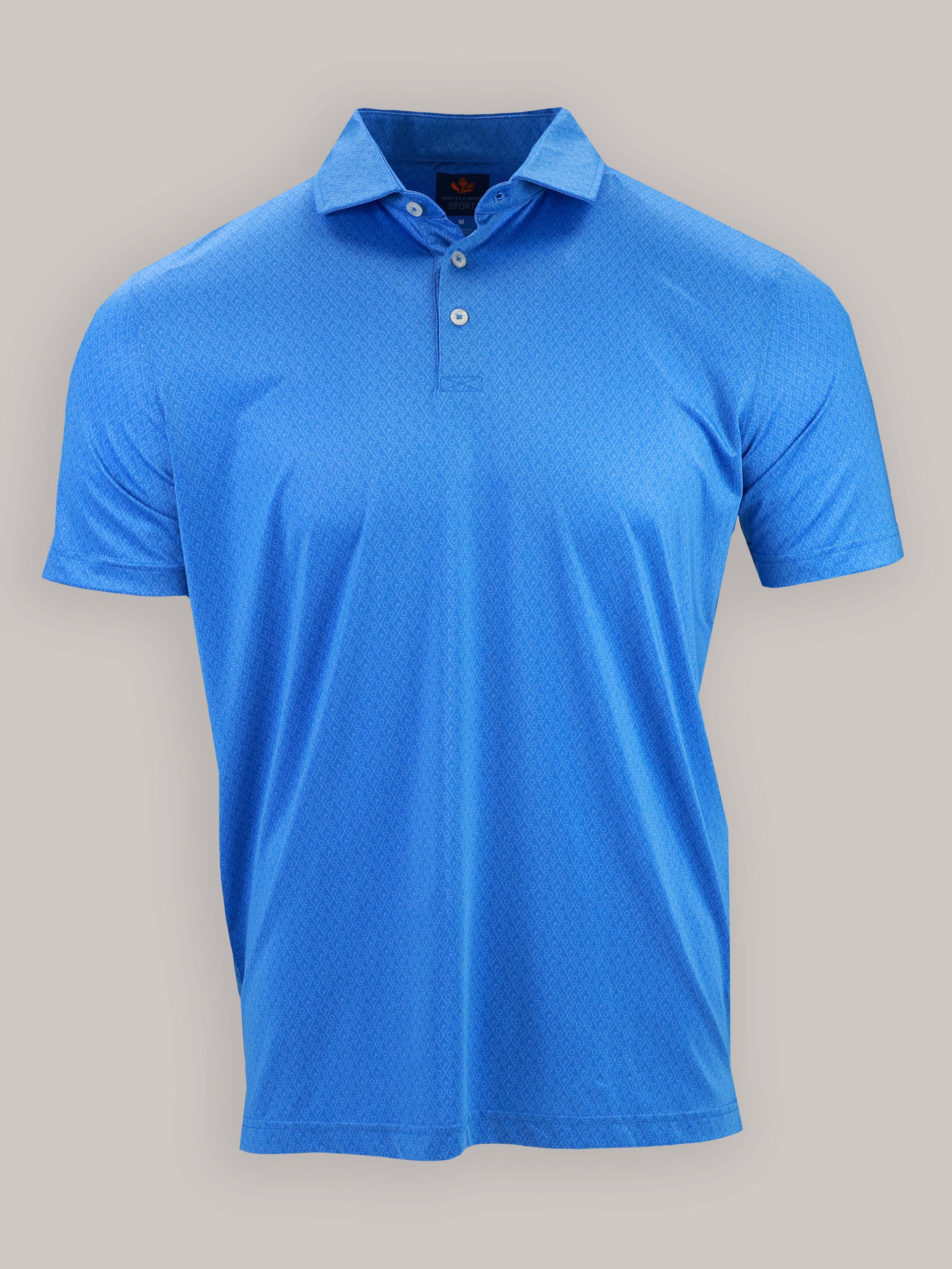A light blue polo shirt with a subtle golf club pattern, featuring a collar and two white buttons on the front. The shirt is neatly displayed on a solid gray background.