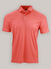 Short-sleeve polo shirt in a vibrant coral color with a subtle pattern and a collared neckline displayed against a plain background.