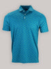 Blue short-sleeve polo shirt with small green shark print, featuring a buttoned collar. The shirt conveys a casual and playful tone.