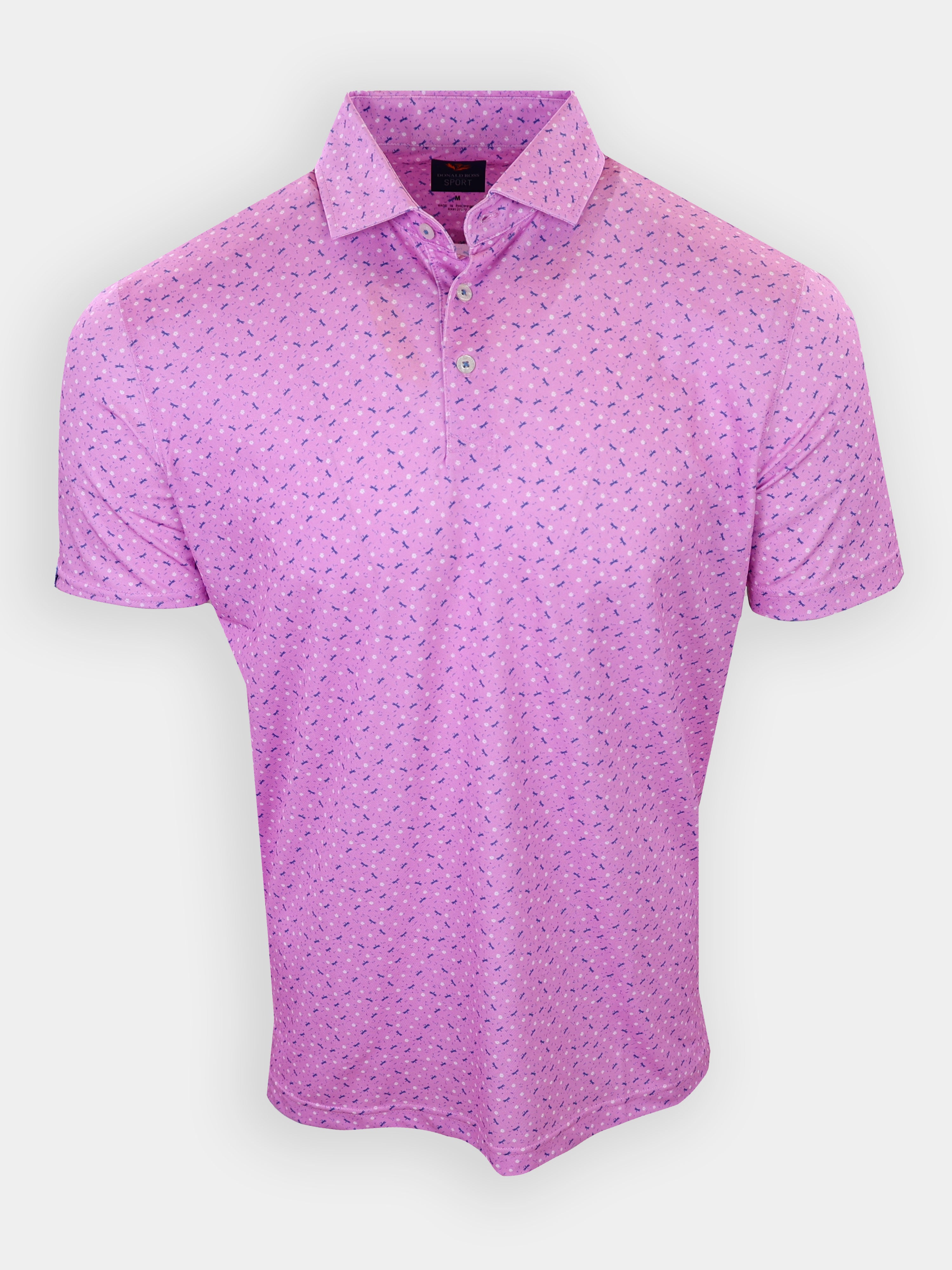 A light pink polo shirt with a patterned design and a folded collar is displayed against a white background.
