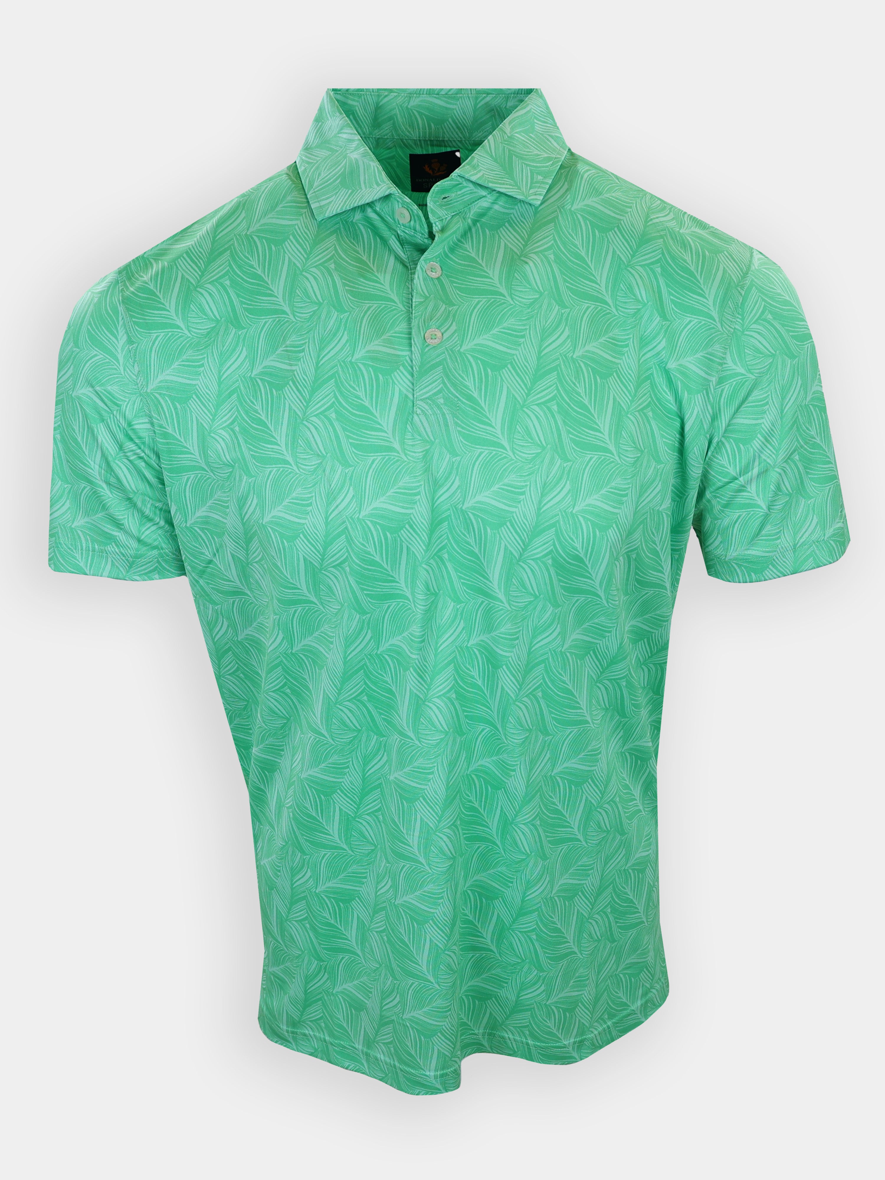 Short-sleeve green polo shirt with a leaf pattern is displayed against a white background.