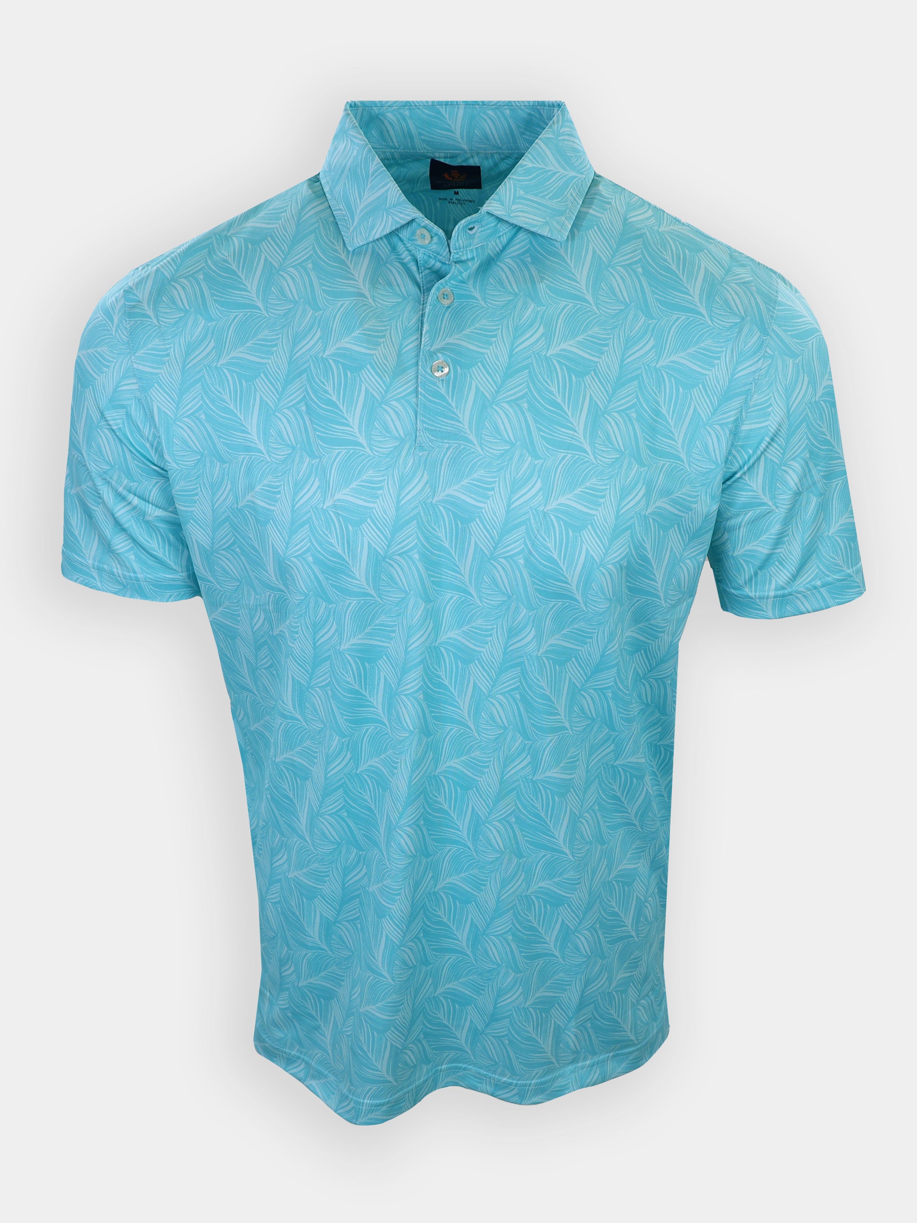 Light blue polo shirt with a leafy pattern displayed against a white background.
