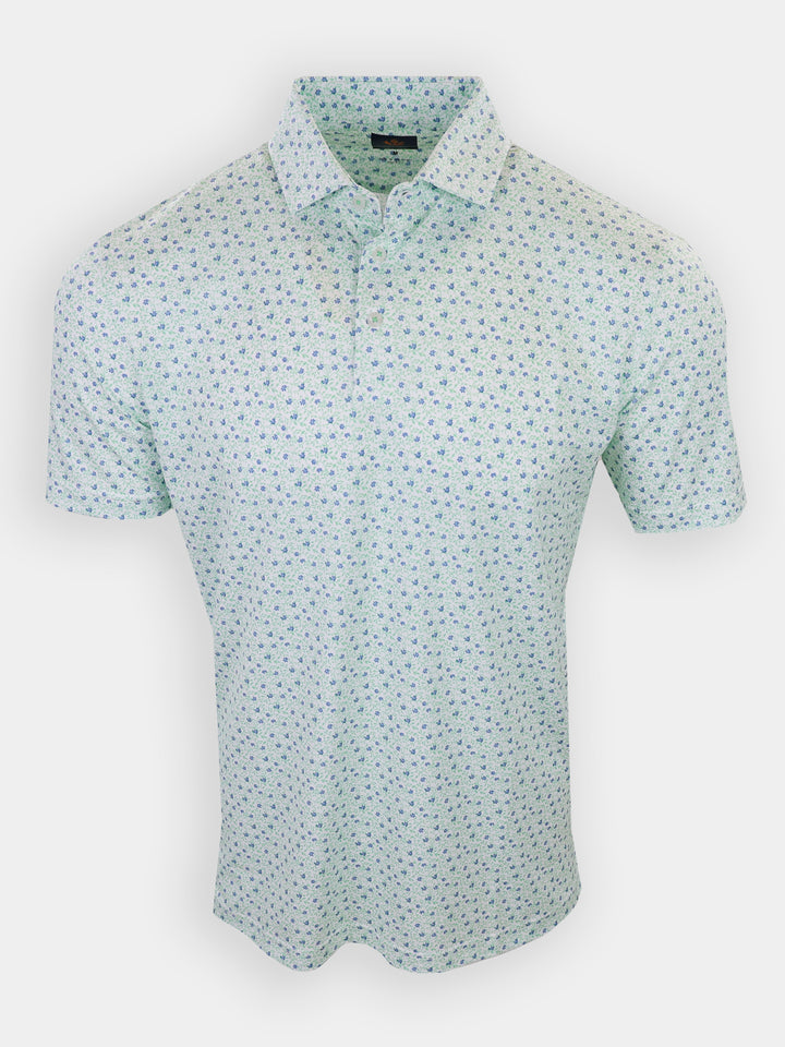 Short-sleeved, light green polo shirt with a floral pattern.