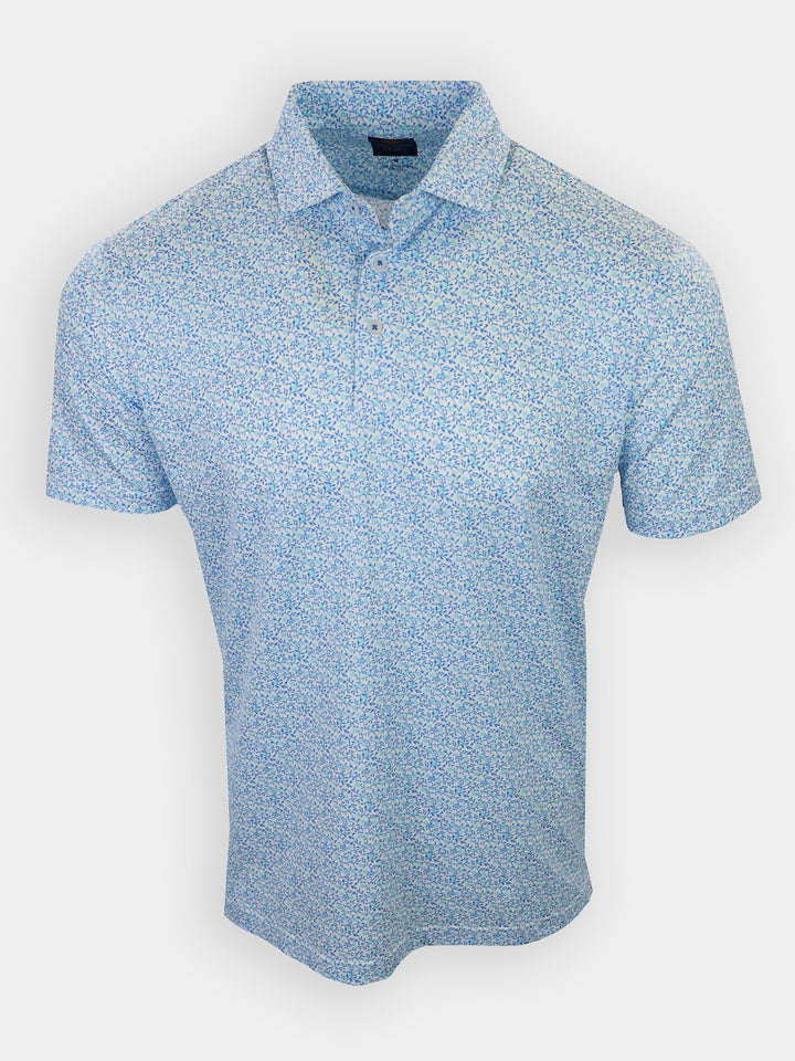 Short-sleeved, light blue polo shirt with a floral pattern is displayed front-facing.