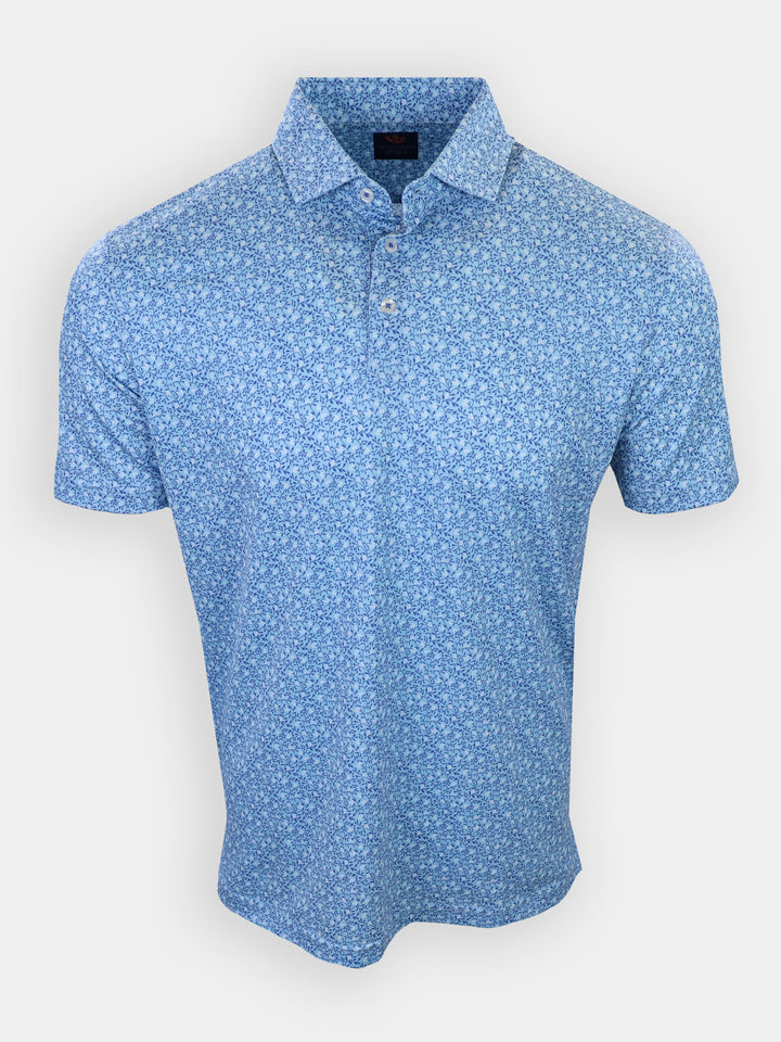 Short-sleeve polo shirt with a blue floral pattern and a buttoned collar.