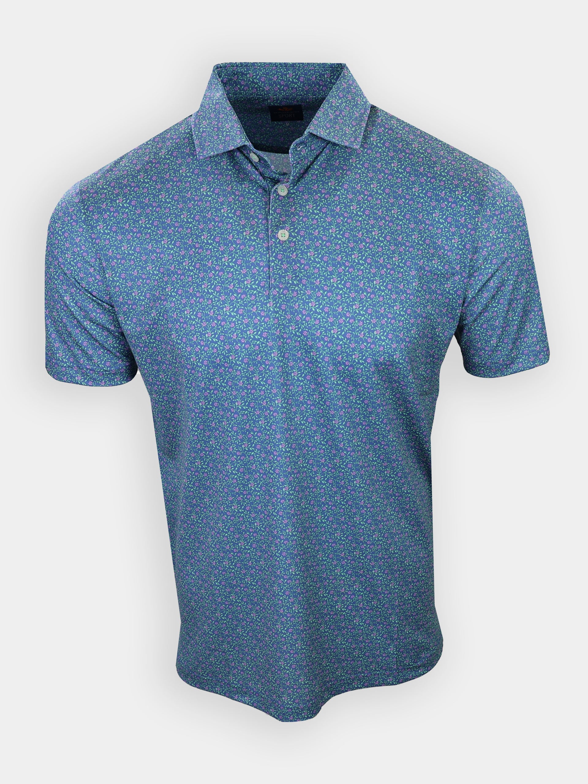 Short-sleeved polo shirt with a blue floral pattern and a collar is displayed against a plain background.