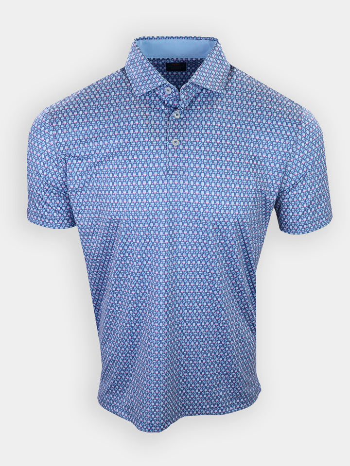 Short-sleeved polo shirt in light blue with a geometric pattern featuring circles in various shades of blue and pink.