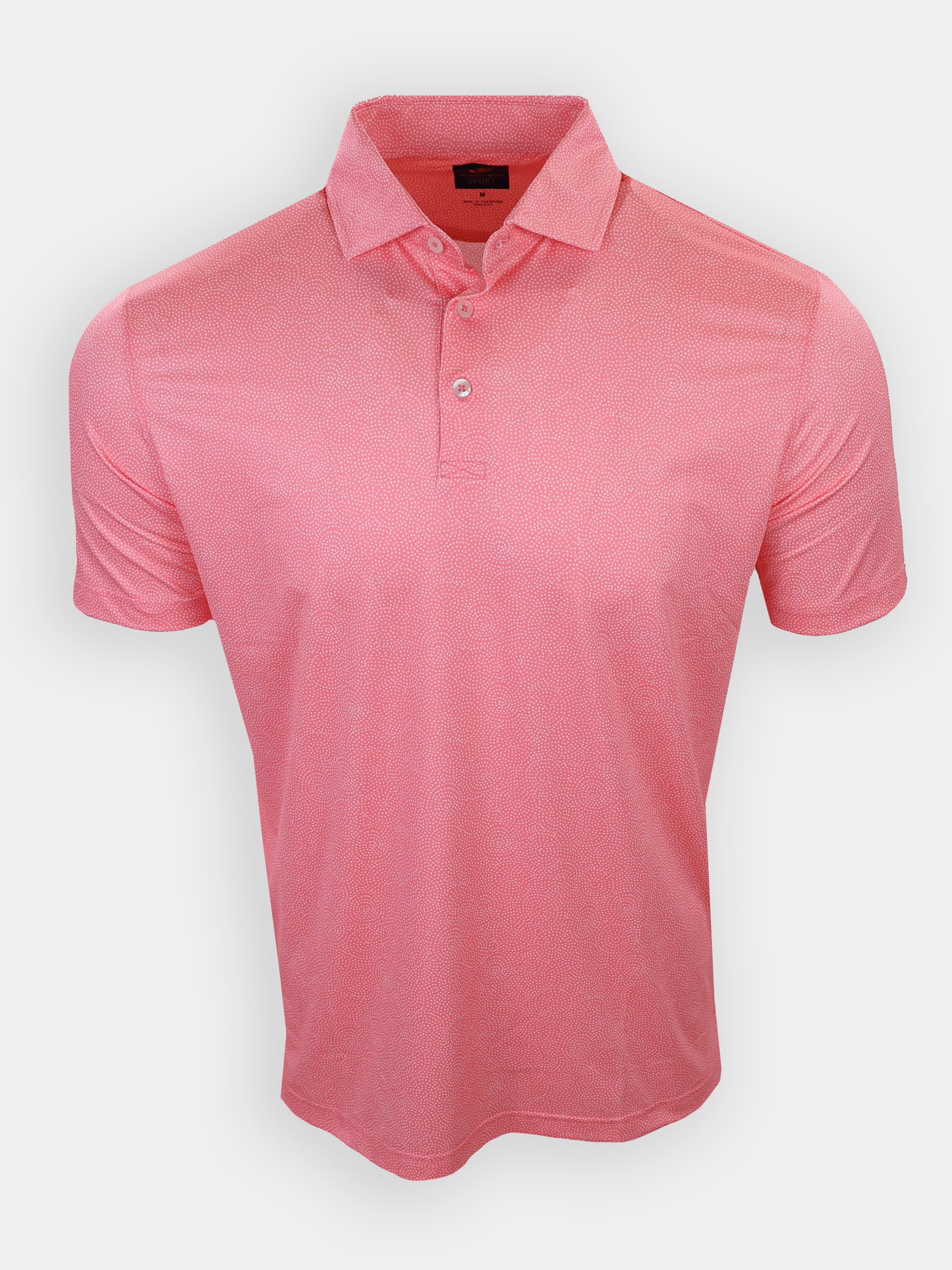 A short-sleeved, pink polo shirt with a patterned design and a collar is displayed against a plain background.