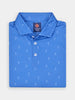 Folded blue polo shirt with white golfer patterns, three white buttons, and a "Donald Ross Sport" label inside the collar