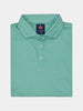 Folded green patterned golf polo shirt with a soft flame printed design, complete with a classic collar