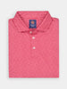 Folded pink polo shirt with a subtle geometric western pattern, featuring three white buttons and a collar.