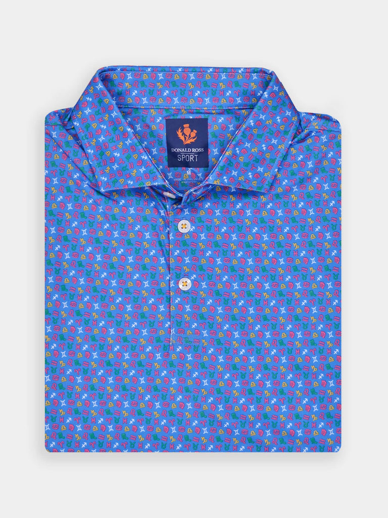Blue golf polo shirt with colorful zodiac symbols, featuring a collar and a Donald Ross Sport label
