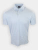 Short-sleeve polo shirt in white with a green dotted pattern and a pointed collar.