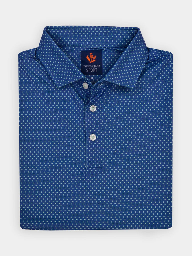 Folded blue fleur de lis shirt with a collar and three white buttons, with a Donald Ross label.