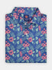 Blue polo shirt with vibrant pink hibiscus flowers and green ferns, folded neatly