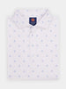White polo shirt with small blue crossed golf club patterns, folded neatly