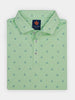 Green polo shirt with a pattern of small dark blue crossed golf clubs, neatly folded