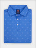 Folded blue golf polo shirt with a subtle white crossed golf club pattern throughout