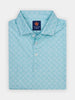 Teal patterned polo shirt neatly folded, featuring an understated skull design