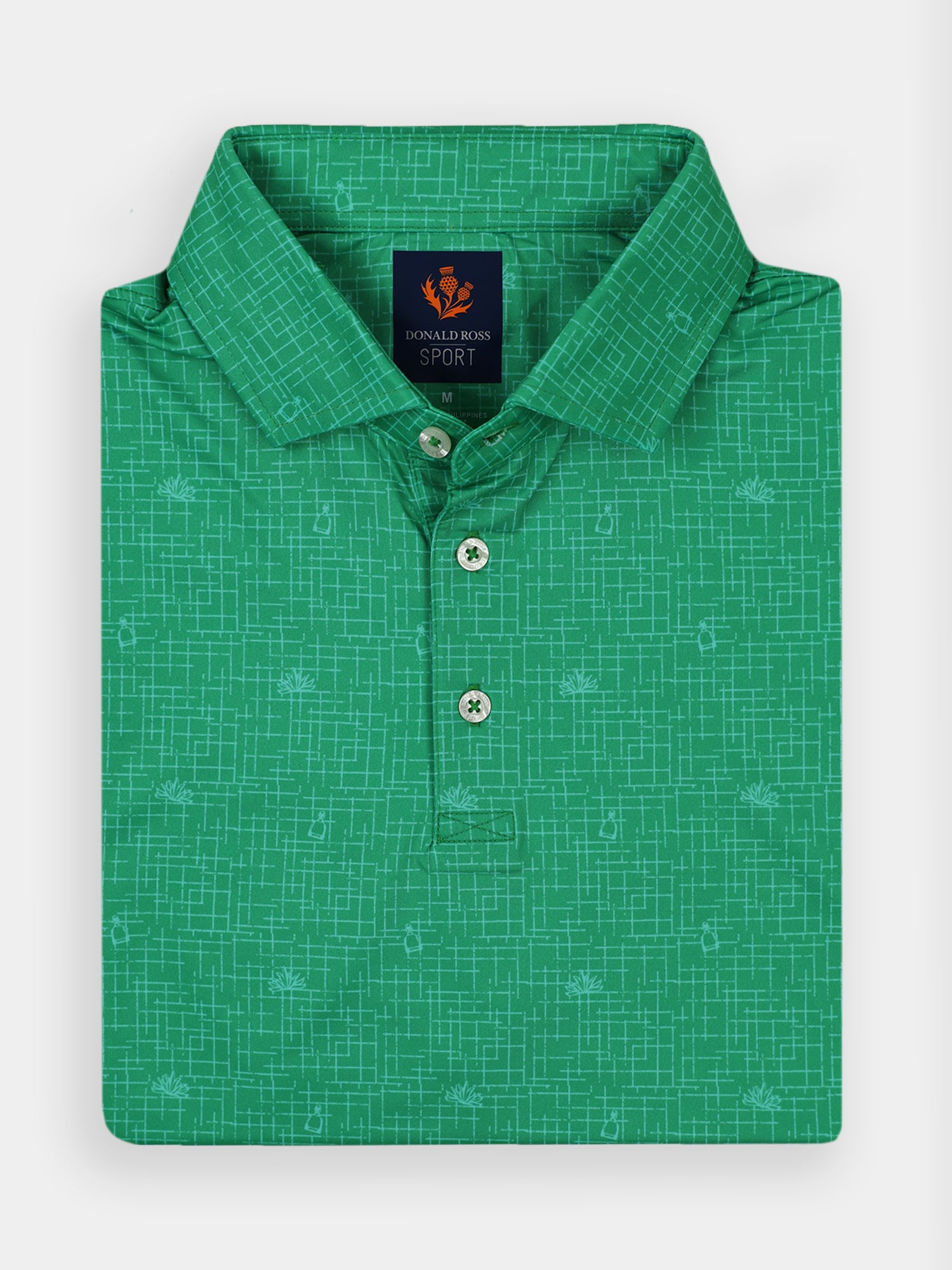 Green men's performance golf polo with tequila pattern