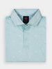A light blue polo shirt with a subtle white tequila pattern and abstract designs