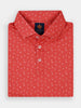 Red polo shirt with small white tropical palm tree and pineapple pattern, neatly folded