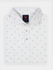 White polo shirt with small green golf club and ball patterns, neatly folded.