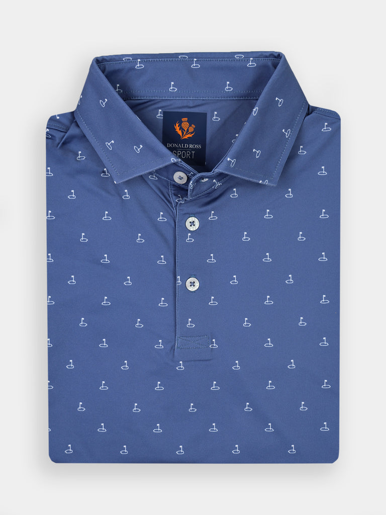 Folded blue polo shirt with small white golf club pattern, featuring a collar and three buttons