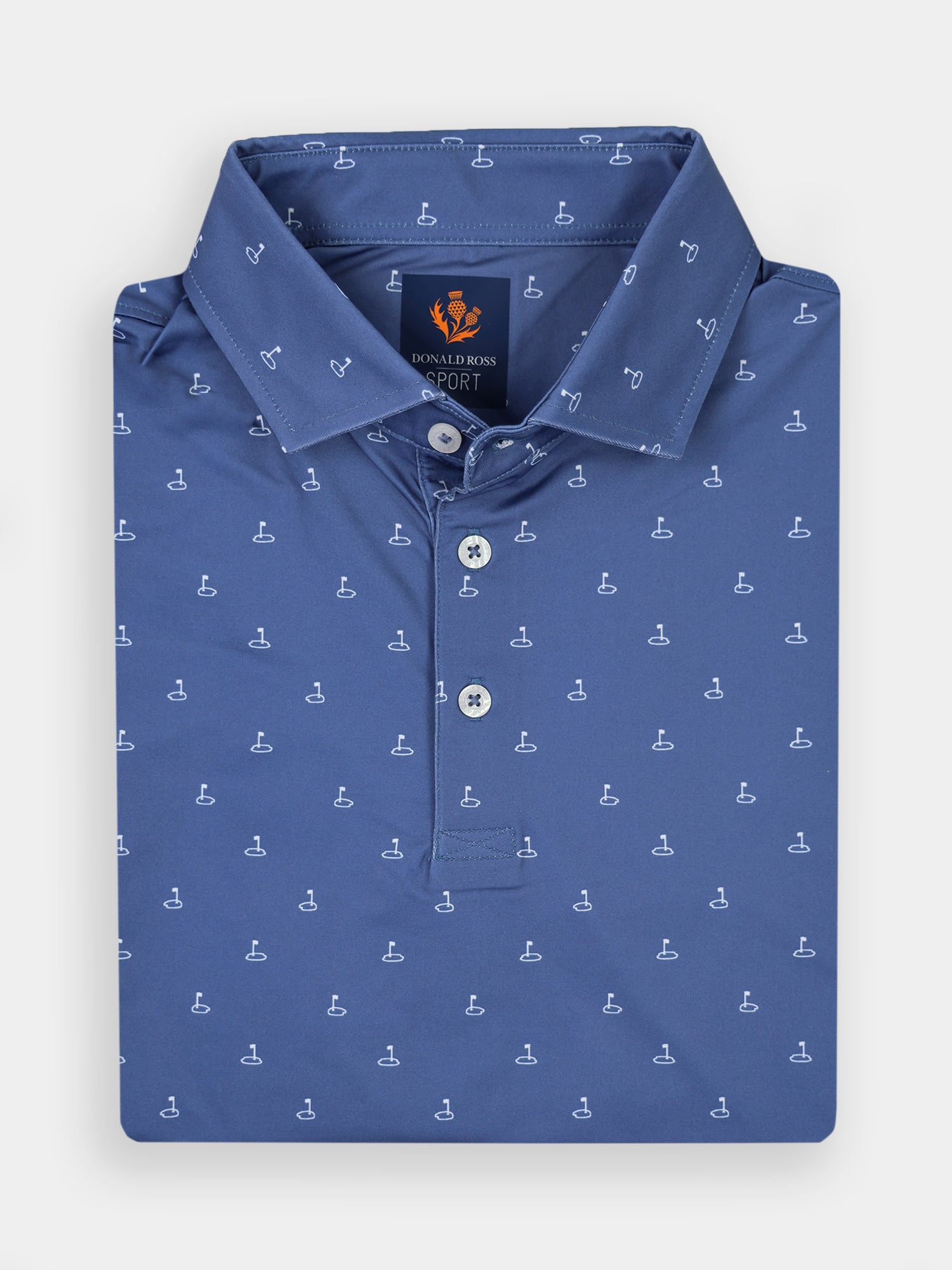 Folded blue polo shirt with small white golf club pattern, featuring a collar and three buttons