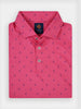 Folded pink polo shirt with dark blue golf flagstick design