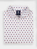 Folded white polo shirt with a small, all-over red and blue liberty bell pattern