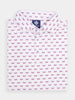 Folded white golf polo shirt with a vibrant red and blue flag pattern