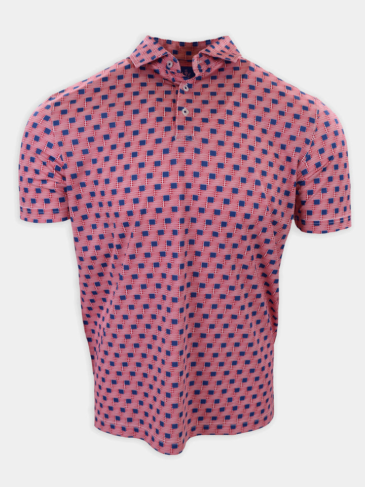 A short-sleeved polo shirt with a pink and blue geometric pattern is displayed against a white background.