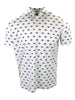 White short-sleeve polo shirt with an all-over pattern of small flag motifs in red, green, and blue.