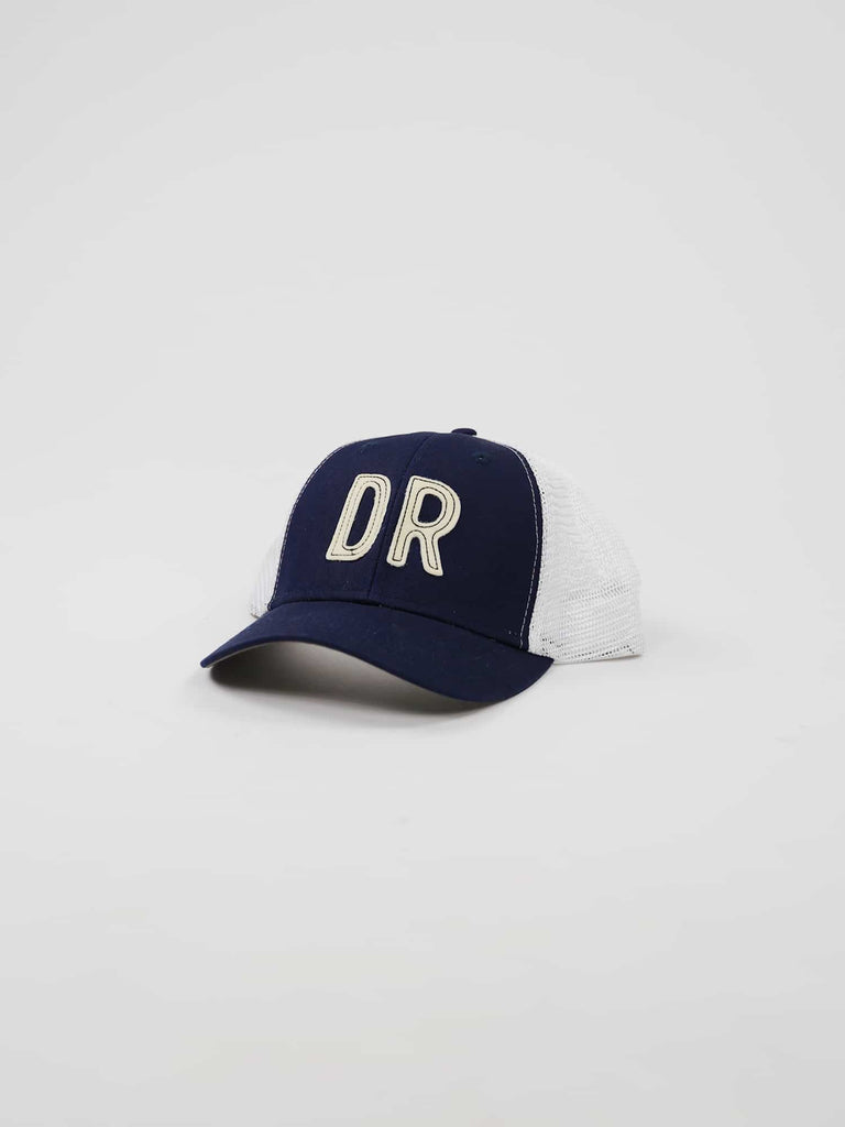 A navy blue baseball cap with white mesh back, displaying bold white letters "DR" on the front
